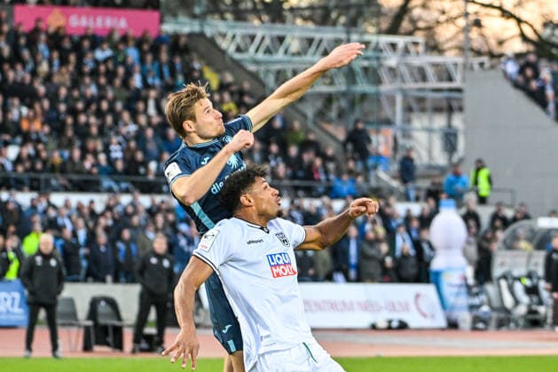 GER, 3 Liga, SSV Ulm 1846 vs TSV 1860 Munich 29 11 2025, Donaustadion, Ulm, GER, 3 Liga, SSV Ulm 1846 vs TSV 1860 Munich, in the picture Siemen Voet Muenchen, 3 , Paul Philipp Besong SSV Ulm, 17 , header nordphotoxGmbHx xHafner nph00200