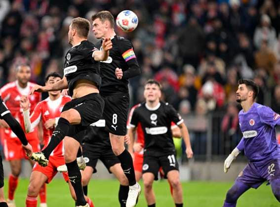 29 11 2025, Soccer Bundesliga 2025 2026, Matchday 12, FC Bayern Munich FC St Pauli, in the Allianz Arena Munich, All Pauli players defend DFL and DFB regulations prohibit any use of photographs as image sequences and or quasi video
