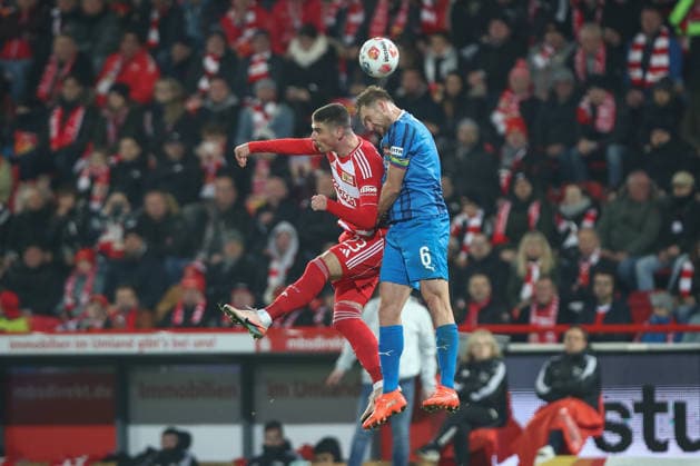 29 11 2025, xtgx, Soccer 1 Bundesliga, 1 FC Union Berlin 1 FC Heidenheim emspor, v l Andrej Ilic Union Berlin, 23 , Patrick Mainka Heidenheim, 6 duel, duel, fight, tackle DFL DFB REGULATIONS PROHIBIT ANY USE OF PHOTOGRAPHS as IMAGE SEQUENCES and or QUASI VIDEO Berlin
