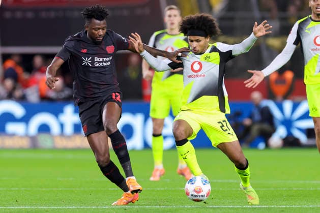 Edmond Tapsoba Bayer 04 Leverkusen and Karim Adeyemi Borussia Dortmund battle for the ball, Bundesliga, Bayer 04 Leverkusen v Borussia Dortmund, BayArena, November 29, 2025 in Leverkusen, Germany Photo by Marco Steinbrenner DeFodi Images Edmond Tapsoba Bayer 04 Leverkusen and Karim Adeyemi Borussia Dortmund battle for the ball, Bundesliga, Bayer 04 Leverkusen v Borussia Dortmund, BayArena, November 29, 2025 in Leverkusen, Germany Photo by Marco Steinbrenner DeFodi Images DFL regulations prohibit any use of photographs as image sequences and or quasi video