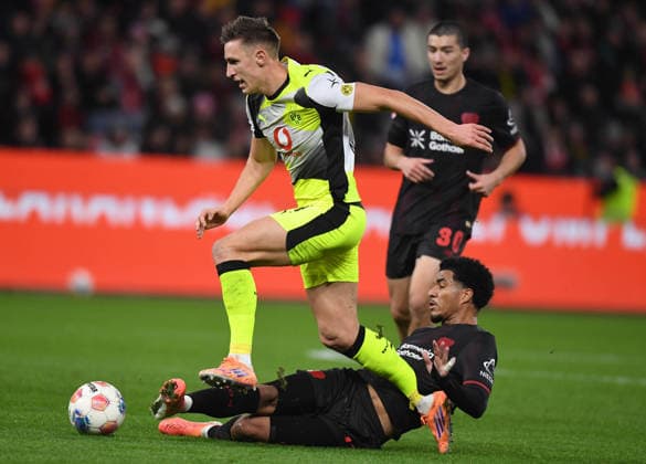 29 11 2025, xophax, Soccer 1 Bundesliga, Bayer 04 Leverkusen Bour Dortmund Nico Schlotterbeck , left Bour Dortmund and Malik Tillmann , right Bayer 04 DFL DFB REGULATIONS PROHIBIT ANY USE OF PHOTOGRAPHS as IMAGE SEQUENCES and or QUASI VIDEO Leverkusen