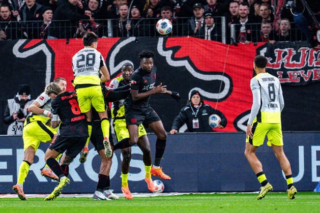 29 11 2025, Bayer 04 Leverkusen vs Borussia Dortmund, 1 Bundesliga, Matchday 12 Goal for 0 1 by Aaron Anselmino Borussia Dortmund 28 here the header shot Important note According to the regulations of the DFL German Football League or the DFB German Football Association, it is prohibited to use photographs taken in the stadium and or of the match in the form of sequential images and or video-like photo series Copyright: xBahhoxKarax