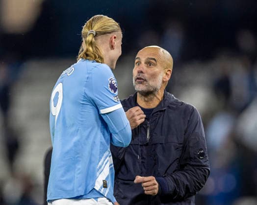 29th November 2025; Etihad Stadium, Manchester, Lancashire, England; Premier League Football, Manchester City versus Leeds United; Manchester City Manager Pep Guardiola talking to Erling Haland  TimxWilliams