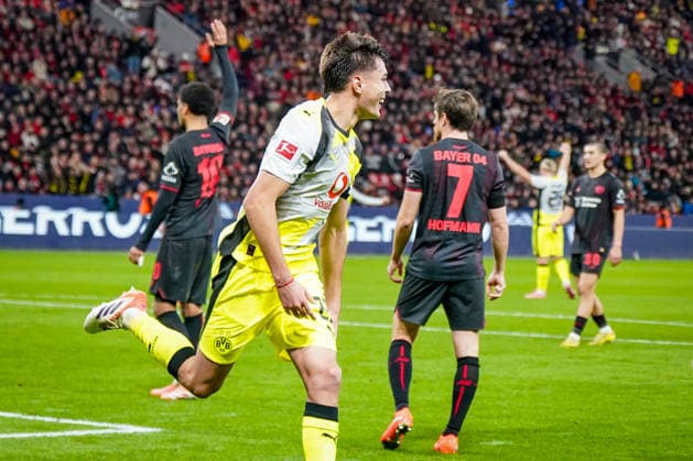 Germany Bundesliga 2025 26, Matchday 12 Bayer 04 Leverkusen vs Borussia Dortmund BayArena Leverkusen Goal and goal celebration to 0 1 by Aaron Anselmino Borussia Dortmund, 28 Joy, emotions, jubilation Copyright: xJOERANxSTEINSIEKx