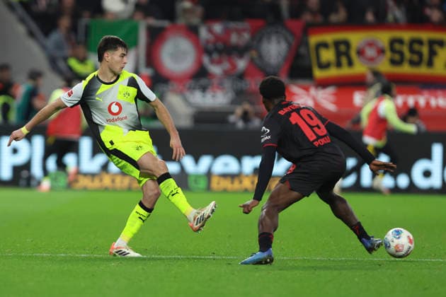 Aaron Anselmino Borussia Dortmund and Ernest Poku Bayer 04 Leverkusen in a duel during the Bundesliga match between Bayer 04 Leverkusen and Borussia Dortmund, BayArena on November 29, 2025 in Leverkusen, Germany, Germany Photo by Oliver Kaelke DeFodi Images Aaron Anselmino Borussia Dortmund and Ernest Poku Bayer 04 Leverkusen battle for the ball during the Bundesliga match between Bayer 04 Leverkusen and Borussia Dortmund at BayArena on November 29, 2025 in Leverkusen, Germany Photo by Oliver Kaelke DeFodi Images DFL regulations prohibit any use of photographs as image sequences and or quasi video Photo by Oliver Kaelke DeFodi Images