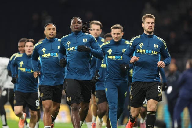 29th November 2025; Tottenham Hotspur Stadium, London, England; Premier League Football, Tottenham Hotspur versus Fulham; Calvin Bassey and Joachim Andersen of Fulham warm up ahead of kick-off  KatiexChan
