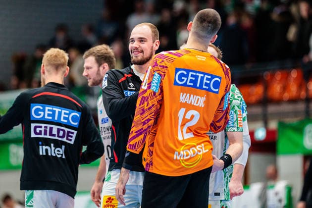 f l Tim Zechel SC Magdeburg, 09 , Matej Mandic SC Magdeburg, 12 cheers after 21 36 victory GER, GWD Minden vs SC Magdeburg, Handball, 1 Bundesliga, Matchday 14, Season 2025 2026, 29 11 2025 GER, GWD Minden vs SC Magdeburg, Handball, 1 Bundesliga, Matchday 14, Season 2025 2026, 29 11 2025 Luebbecke Copyright: xEibner-Pressefoto JanxRollingerx EP_JSK