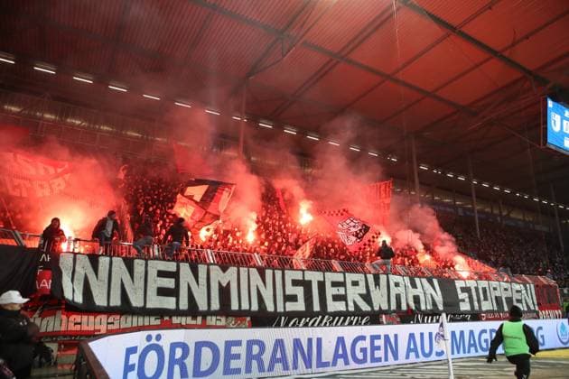 29 11 2025 Soccer Season 2025 2026 2 Soccer Bundesliga 14 Matchday 1 FC Magdeburg FCM 1 FC Nuremberg FCN Club Sportfoto Zink DaMa xdaxmax DFL regulations prohibit any use of photographs as image sequences and or quasi video only for editorial use Symbolbild Symbolfoto Feature Impression Pyrotechnik Pyro Bengalfackel Bengalfackeln Rauch der Clubfan Clubfans FCN Fans Fans im Gästeblock Spruchband Transparent Innenministerwahnsinn stoppen