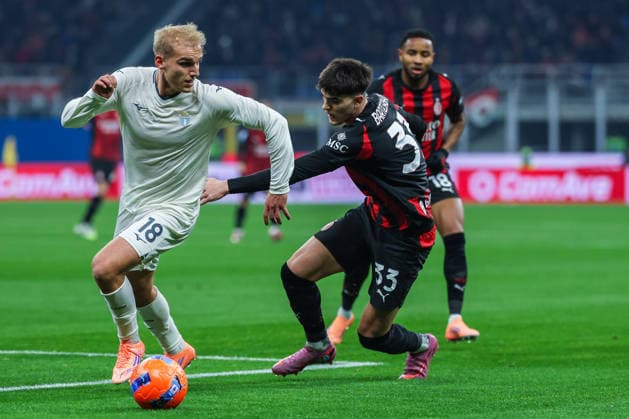 Christopher Alan Nkunku of AC Milan competes for the ball with Davide Bartesaghi of AC Milan during Serie A 2025 26 football match between AC Milan and SS Lazio at San Siro Stadium in Milan  Copyright: xFabrizioxCarabelli IPAxSportx xipa-agency.netx xx IPA_68529901 IPA_Agency_IPA68529901