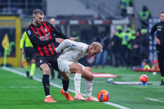 Strahinja Pavlovic of AC Milan competes for the ball with Gustav Isaksen of SS Lazio during Serie A 2025 26 football match between AC Milan and SS Lazio at San Siro Stadium in Milan  Copyright: xFabrizioxCarabelli IPAxSportx xipa-agency.netx xx IPA_68529932 IPA_Agency_IPA68529932