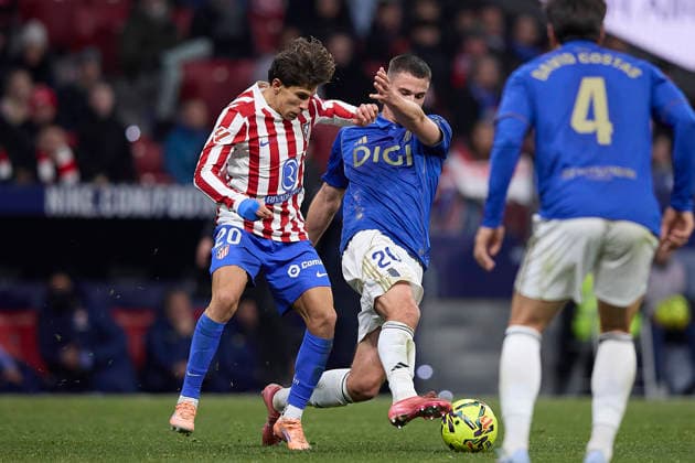 Giuliano Simeone Atletico de Madrid and Leander Dendoncker Real Oviedo battle for the ball during the LaLiga EA Sports match between AtlÃ tico Madrid v Real Oviedo at Estadio Riyadh Air Metropolitano on November 29, 2025 in Madrid, Spain Photo by Manu Reino DeFodi Images