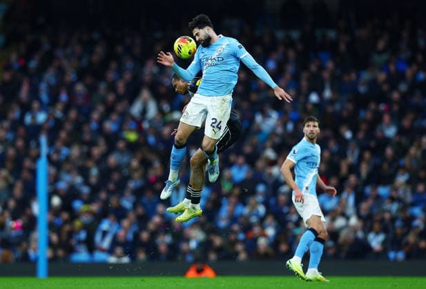 Josko Gvardiol of Manchester City and Lukas Nmecha of Leeds United Manchester City v Leeds United, Premier League, Football, Etihad Stadium, Manchester, UK - 29 Nov 2025Manchester Etihad Stadium United Kingdom EDITORIAL USE ONLY No use with unauthorised audio, video, data, fixture lists, club league logos or live services. Online in-match use limited to 120 images, no video emulation. No use in betting, games or single club league player publications. Copyright: xMattxWest Shutterstockx 15941574aw