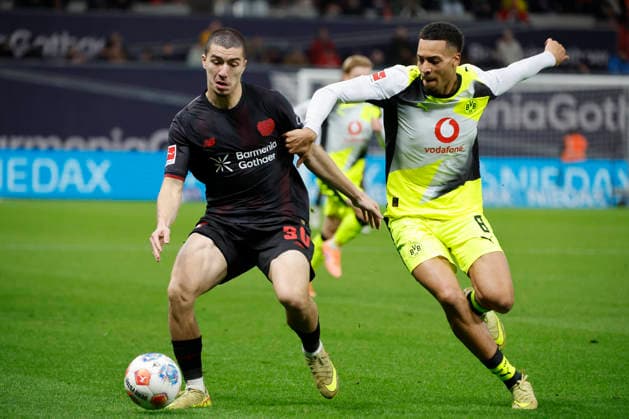 Leverkusen, Germany, 1 Soccer Bundesliga 12 Matchday Season 2025 26 Bayer 04 Leverkusen Borussia Dortmund 1 2 on 29 11 2025 at Bay Arena in Leverkusen Ibrahim MAZA LEV left and Felix NMECHA BVB right