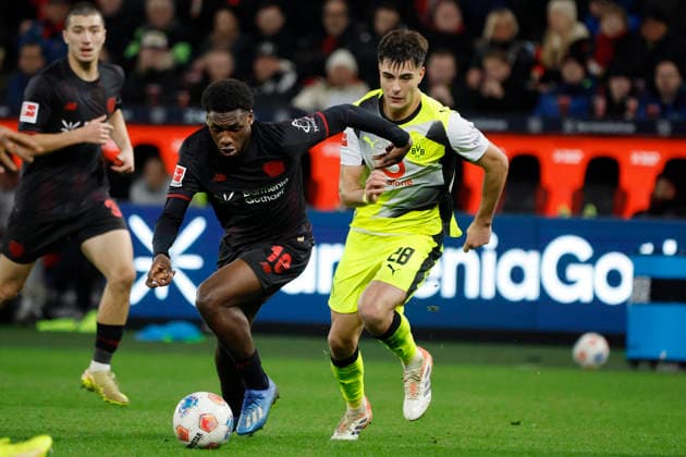 Leverkusen, Germany, 1 Soccer Bundesliga 12 Matchday Season 2025 26 Bayer 04 Leverkusen Borussia Dortmund 1 2 on 29 11 2025 at Bay Arena in Leverkusen Ernest POKU LEV 2 v left and Aaron ANSELMINO BVB right