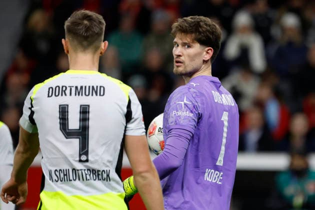 Leverkusen, Germany, 1 Soccer Bundesliga 12 Matchday Season 2025 26 Bayer 04 Leverkusen Borussia Dortmund 1 2 on 29 11 2025 at Bay Arena in Leverkusen Nils SCHLOTTERBECK BVB left and goalkeeper Gregor KOBEL BVB right