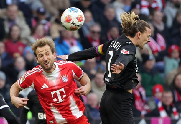 29 11 2025,1 Bundesliga, FC Bayern Muenchen vs St Pauli, Allianz Arena Muenchen, Soccer, Sports, in picture Harry Kane FC Bayern Muenchen vs Jackson Irvine St Pauli