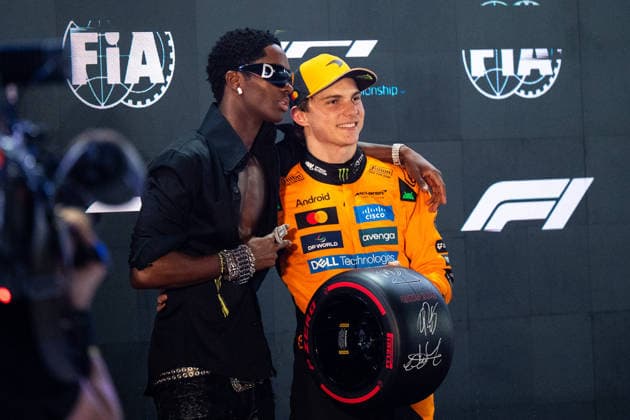 Oscar Piastri McLaren Formula 1 Team, Australia, 81 is happy about pole position starting position 1 and receives the Pirelli Pole Position Award from Alton Mason Model, QTR, Formula 1 World Championship, Qatar Grand Prix, Lusail International Circuit, Qualifying, 29 11 2025 QTR, Formula 1 World Championship, Qatar Grand Prix, Lusail International Circuit, 29 11 2025 Lusail Copyright: xEibner-Pressefoto Memmlerx EP_MMR