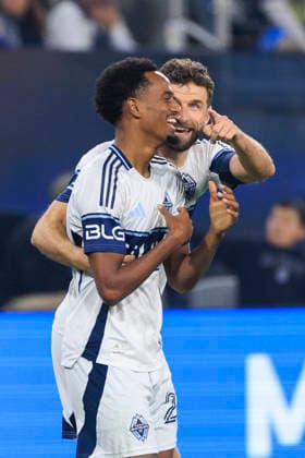 November 29, 2025, San Diego, California, USA: Thomas Muller 13 of Vancouver Whitecaps celebrates with Ali Ahmed 22 who scored a goal during the Audi 2025 MLS, Fussball Herren, USA Cup Playoffs Western Conference Final match against the San Diego FC on Saturday November 29, 2025 at Snapdragon Stadium in San Diego, California. Vancouver Whitecaps defeat San Diego FC, 3-1. JAVIER ROJAS PI San Diego USA - ZUMAp124 20251129_zaa_p124_004 Copyright: xJavierxRojasx