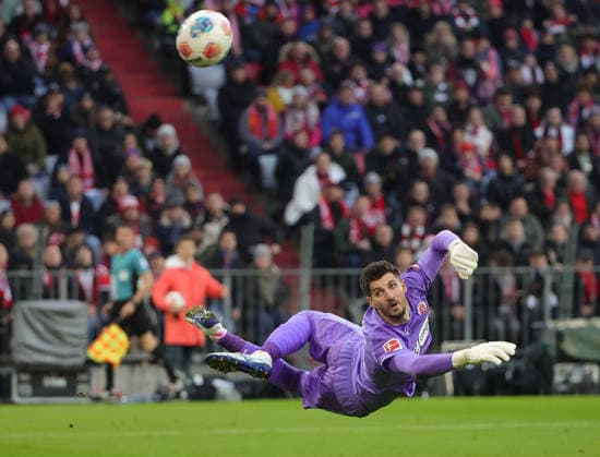 (251130) -- MUNICH, Nov. 30, 2025 -- Nikola Vasilj, goalkeeper of FC St. Pauli, makes a save during the German first division Bundesliga football match between FC Bayern Munich and FC St. Pauli in Munich, Germany, Nov. 29, 2025. (Photo by Xinhua) (SP)GERMANY-MUNICH-FOOTBALL-BUNDESLIGA-BAYERN MUNICH VS ST. PAULI PhilippexRuiz 