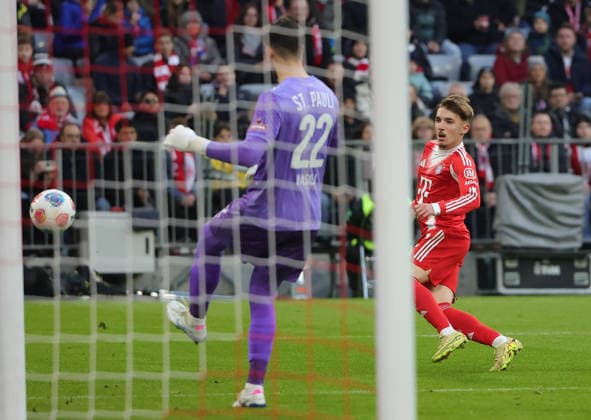(251130) -- MUNICH, Nov. 30, 2025 -- Nikola Vasilj (L), goalkeeper of FC St. Pauli, kicks the ball as Lennart Karl of FC Bayern Munich reacts during the German first division Bundesliga football match between FC Bayern Munich and FC St. Pauli in Munich, Germany, Nov. 29, 2025. (Photo by Xinhua) (SP)GERMANY-MUNICH-FOOTBALL-BUNDESLIGA-BAYERN MUNICH VS ST. PAULI PhilippexRuiz 