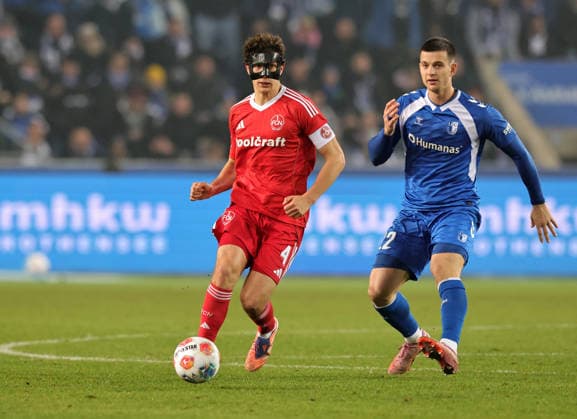 29 11 2025 Soccer Season 2025 2026 2 Soccer Bundesliga 14 Matchday 1 FC Magdeburg FCM 1 FC Nuremberg FCN Club Sportfoto Zink DaMa xdaxmax DFL regulations prohibit any use of photographs as image sequences and or quasi video only for editorial use Fabio Gruber 4, 1 FC Nuremberg FCN Pierre Nadjombe 22, 1 FC Magdeburg FCM
