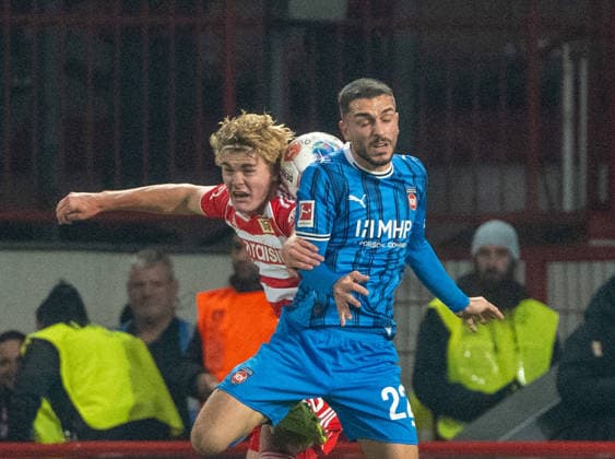 Soccer, Men, Season 2025 2026, 1 Bundesliga 12 Matchday , 1 FC Union Berlin 1 FC Heidenheim, f l Tom Rothe 1 FC Union Berlin , Arijon Ibrahimovic 1 FC Heidenheim , 29 11 2025, Copyright: xMatthiasxKochx