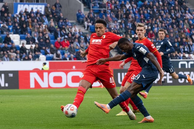 v li Noahkai Banks FC Augsburg, 40 , Bazoumana Toure TSG 1899 Hoffenheim, 29 Goal shot, , Anton Kade FC Augsburg, 30 GER, TSG 1899 Hoffenheim vs FC Augsburg, Football, Men, 1 Bundesliga, Matchday 12, Season 2025 2026, 29 11 2025, DFL DFB REGULATES PROHIBIT ANY USE OF PHOTOGRAPHS AS IMAGE SEQUENCES AND OR QUASI VIDEO, GER, TSG 1899 Hoffenheim vs FC Augsburg, Football, Men, 1 Bundesliga, Matchday 12, Season 2025 2026, 29 11 2025 Sinsheim Copyright: xEibner-Pressefoto WolfgangxFrankx EP_WFK