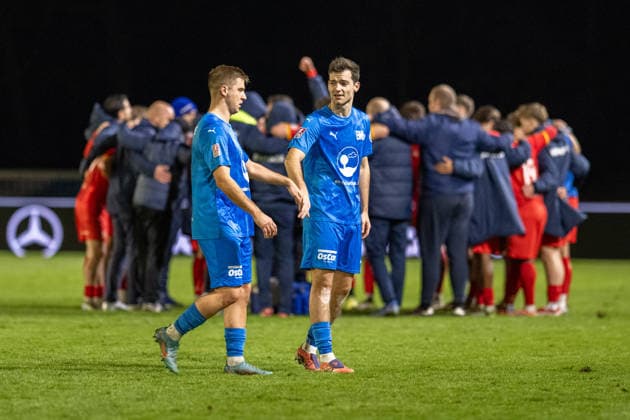 Football, Regionalliga Nord, BW Lohne Bremer SV, 21 Matchday, Season 2025 2026, 29 11 2025 Martin Kobylanski Blau Weiss Lohne 18 and Nico Thoben Blau Weiss Lohne 8 in front of cheering Bremen players , Lohne Heinz Dettmer Stadion Niedersachsen Germany