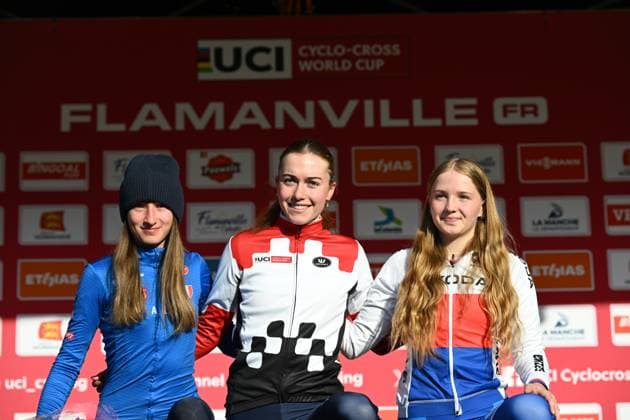 Italian Giorgia Pellizotti, French Lise Revol and Lucie Grohova pictured on the podium after the women s under 19 race at the Cyclocross World Cup cyclocross event in Flamanville, France, Sunday 30 November 2025, the 2nd stage (out of 12) in the World Cup of the 2025-2026 season. DAVIDxPINTENS  x145351193x