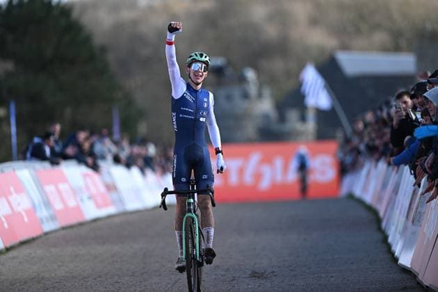 French Aubin Sparfel pictured as he crosses the finish line of the men s under 23 race at the Cyclocross World Cup cyclocross event in Flamanville, France, Sunday 30 November 2025, the 2nd stage (out of 12) in the World Cup of the 2025-2026 season. DAVIDxPINTENS  x145361972x