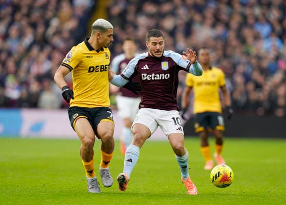 Birmingham, England, 30th November 2025. Andre of Wolverhampton Wanderers (l) tussles with Emiliano Buendia of Aston Villa (r) during the Aston Villa vs Wolverhampton Wanderers Premier League match at Villa Park, Birmingham. Picture credit should read: Andrew Yates Sportimage EDITORIAL USE ONLY. No use with unauthorised audio, video, data, fixture lists, club league logos or live services. Online in-match use limited to 120 images, no video emulation. No use in betting, games or single club league player publications. SPI_015_AY_Villa_Wolves SPI-4336-0014