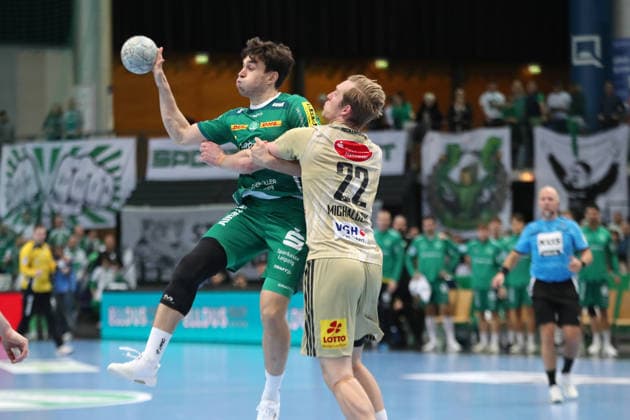 Handball DAIKIN HBL, SC DHfK Leipzig TSV Hannover Burgdorf 30 11 2025 Matej Klima 13, SC DHfK Leipzig vs Marian Michalczik 22, Hannover Burgdorf Handball, DAIKIN HBL, 1 Bundesliga, Season 2025 2026, Matchday 14 SC DHfK Leipzig vs TSV Hannover Burgdorf on 30 11 2025 at Quarterback Immobilien Arena Leipzig Copyright: xBEAUTIFULxSPORTS JanxKaeferx