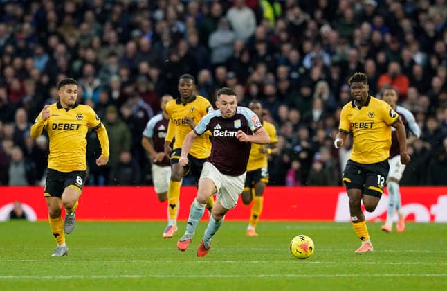 Birmingham, England, 30th November 2025. John McGinn of Aston Villa breaks clear during the Aston Villa vs Wolverhampton Wanderers Premier League match at Villa Park, Birmingham. Picture credit should read: Andrew Yates Sportimage EDITORIAL USE ONLY. No use with unauthorised audio, video, data, fixture lists, club league logos or live services. Online in-match use limited to 120 images, no video emulation. No use in betting, games or single club league player publications. SPI_034_AY_Villa_Wolves SPI-4336-0034