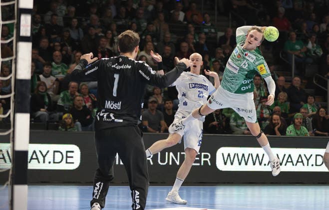Goalkeeper Constantin Möstl , Leve Carstensen, Tobias Schjoelberg Groendahl scores a goal duel Match scene Action Sport Handball HBL Bundesliga Men 14 Matchday Season 2025 2026 30 11 2025 Füchse Berlin vs TBV Lemgo Lippe