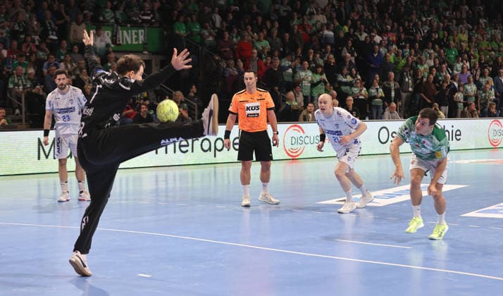 Goalkeeper Constantin Möstl holds off Tim Freihöfer in a duel Game scene Action Sport Handball HBL Bundesliga Men 14 Matchday Season 2025 2026 30 11 2025 Füchse Berlin vs TBV Lemgo Lippe