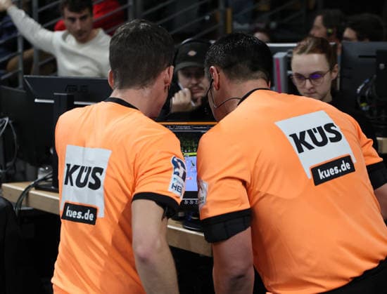 GER HBL season 2025 2026 FÜCHSE Berlin vs TBV Lemgo Lippe, 30 11 25, Max Schmeling Halle, Berlin, Andre Plischek HBL referee and Fabian Baumgartt, HBL referee check the video evidence