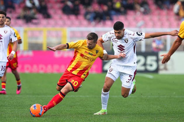Ylber Ramadani of US Lecce and Adam Masina of Torino FC compete for the ball during the serie A match between US Lecce and Torino FC at Ettore Giardiniero - Via del Mare stadium in Lecce (Italy), November 30,2025. massimilianoxcarnabuci