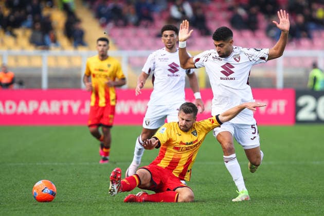 Ylber Ramadani of US Lecce and Adam Masina of Torino FC compete for the ball during the serie A match between US Lecce and Torino FC at Ettore Giardiniero - Via del Mare stadium in Lecce (Italy), November 30,2025. massimilianoxcarnabuci