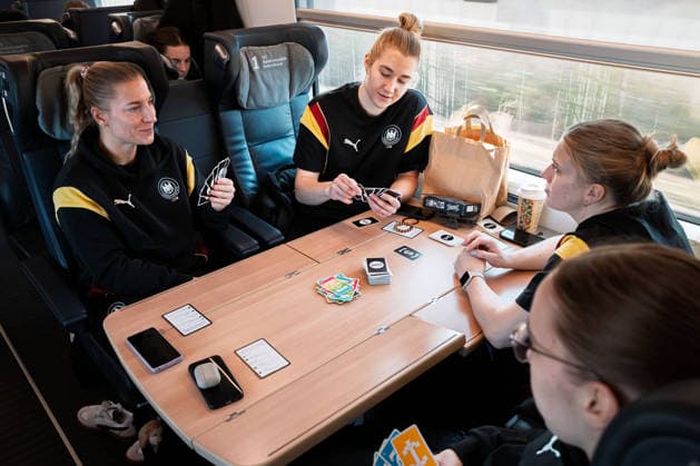 Handball, Women Germany Train journey to Dortmund Jenny Behrend Germany , Goalkeeper Katharina Filter Germany , Alexia Hauf Germany , Nieke Kühne Kuehne Germany play cards Stuttgart Baden Württemberg Germany