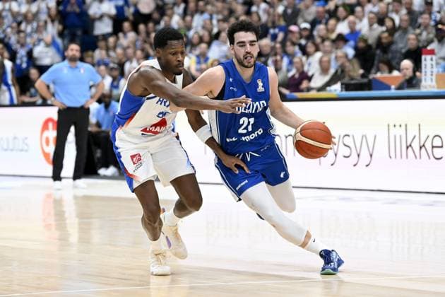 Gerald Ayayi of France (left) and Edon Maxhuni of Finland in action during men s FIBA World Cup basketball qualifying match Finland vs France in Espoo, Finland on December 1, 2025. Espoo Finland LKFTJK20251201191359UFDZ  Copyright: xMikkoxStigx LKFTJK20251201191359UFDZ