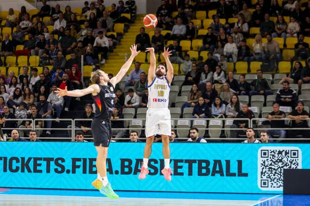 FIBA World Cup Qualifiers : Cyprus vs Germany NIKOS STYLIANOU of Cyprus shots a 3-pointer. Cyprus plays vs Germany for the Group E of the FIBA Basketball World Cup European Qualifiers, at Spyros Kyprianou Arena, Limassol, Cyprus, on Dec. 1, 2025.. Cyprus plays vs Germany for the Group E of the FIBA Basketball World Cup European Qualifiers, at Spyros Kyprianou Arena, Limassol, Cyprus, on Dec. 1, 2025. Limassol Cyprus Copyright: xKOSTASxPIKOULASx