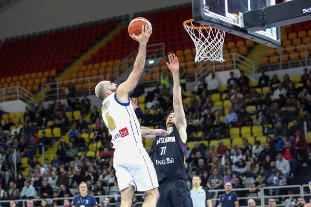 FIBA World Cup Qualifiers : Cyprus vs Germany SIMON MICHAIL of Cyprus scores in front of JOSHUA OBIESIE of Germany. Cyprus plays vs Germany for the Group E of the FIBA Basketball World Cup European Qualifiers, at Spyros Kyprianou Arena, Limassol, Cyprus, on Dec. 1, 2025. Limassol Cyprus Copyright: xKOSTASxPIKOULASx
