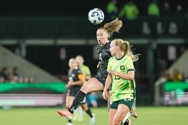 December 2, 2025, Adelaide, South Australia, Australia: CJ BOTT of New Zealand clears a header over the top of HOLLY MCNAMARA of Australia as New Zealand try to penetrate the Australian defence during the FIFA International Friendly, Länderspiel, Nationalmannschaft between the Australian Matildas and the New Zealand Female Ferns. Adelaide Australia - ZUMAw216 20251202_zsp_w216_013 Copyright: xMarkxWilloughbyx