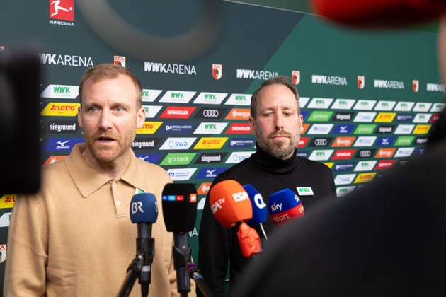 Media round with managing director Michael Ströll black sweater and sports director Benjamin Weber light sweater after the dismissal of Sandro WagnerMedia round with managing director Michael Ströll dark sweater and sports director Benjamin Weber light sweater after the dismissal of Sandro Wagner