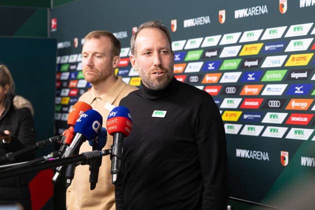 Media round with managing director Michael Ströll black sweater and sports director Benjamin Weber light sweater after the dismissal of Sandro WagnerMedia round with managing director Michael Ströll dark sweater and sports director Benjamin Weber light sweater after the dismissal of Sandro Wagner