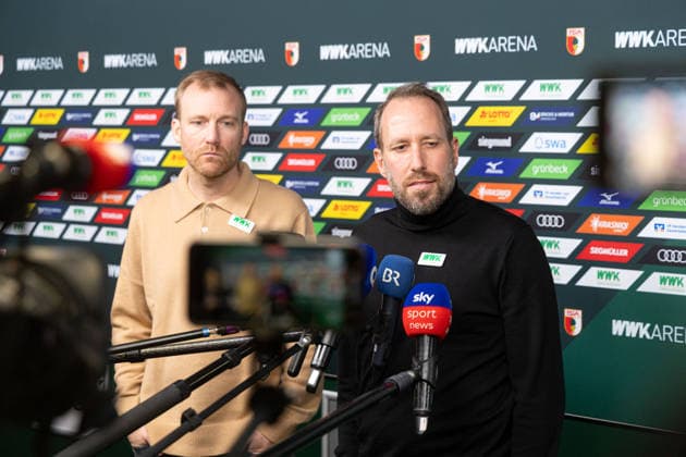 Media round with managing director Michael Ströll black sweater and sports director Benjamin Weber light sweater after the dismissal of Sandro WagnerMedia round with managing director Michael Ströll dark sweater and sports director Benjamin Weber light sweater after the dismissal of Sandro Wagner