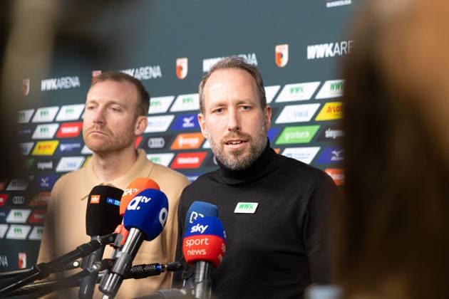 Media round with managing director Michael Ströll black sweater and sports director Benjamin Weber light sweater after the dismissal of Sandro WagnerMedia round with managing director Michael Ströll dark sweater and sports director Benjamin Weber light sweater after the dismissal of Sandro Wagner