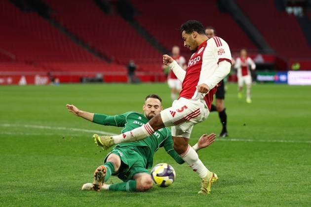 AMSTERDAM , 02-12-2025 , JohanCruyff Arena , season 2025 2026 , Dutch Eredivisie Football , match between Ajax and FC Groningen (replay) , Picture shows , Ajax player Owen Wijndal, FC Groningen player Marco Rente Ajax - Groningen (replay)  x32312920x Copyright: