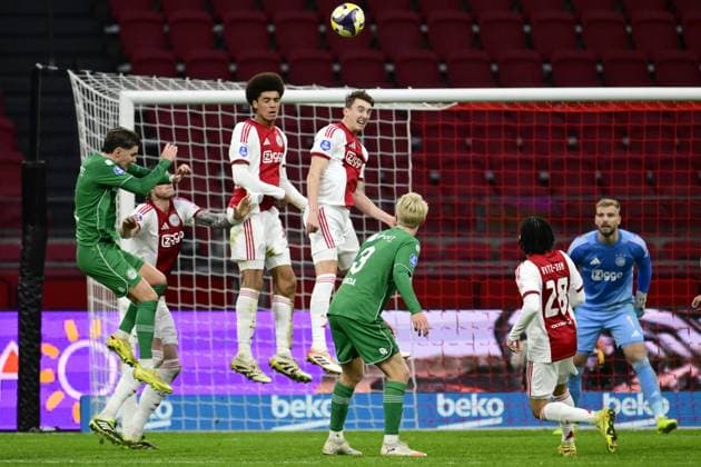 AMSTERDAM (l-r) Brynjolfur Andersen Willumsson of FC Groningen, Wout Weghorst of AFC Ajax, Aaron Bouwman of AFC Ajax, and Youri Baas of AFC Ajax during the remainder of the Dutch Eredivisie match between AFC Ajax and FC Groningen at the Johan Cruijff ArenA, without an audience, on December 2, 2025, in Amsterdam, Netherlands. The match was abandoned after supporters set off fireworks twice. ANP OLAF KRAAK Eredivisie 2025-2026 xVIxANPxSportx xxANPxIVx 543675469 originalFilename: 543675469.jpg
