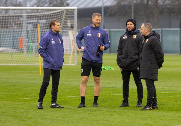 Manuel Baum coach FC Augsburg, re in conversation with Benedikt Brust match and video analyst FC Augsburg, Quirin Löppert rehab and athletics coach FC Augsburg and Fabio Leutenecker co-coach FCA U 17 FC Augsburg, first training under Manuel Baum,